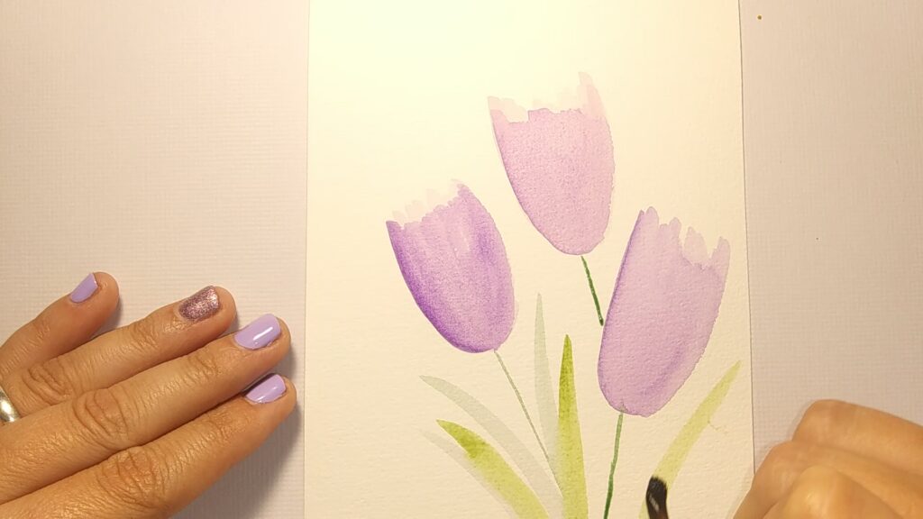 Painting the leaves of a tulip